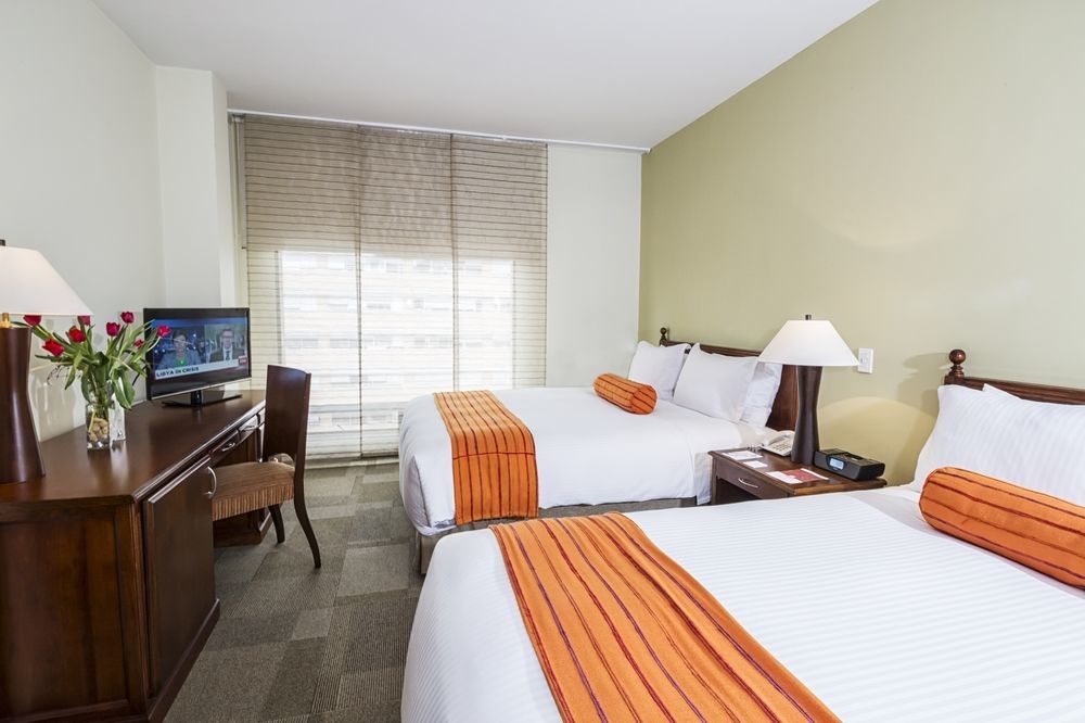 Cosmos 100 Hotel & Centro De Convenciones - Hoteles Cosmos Bogotá Exterior foto A typical guest room at the Hilton Garden Inn