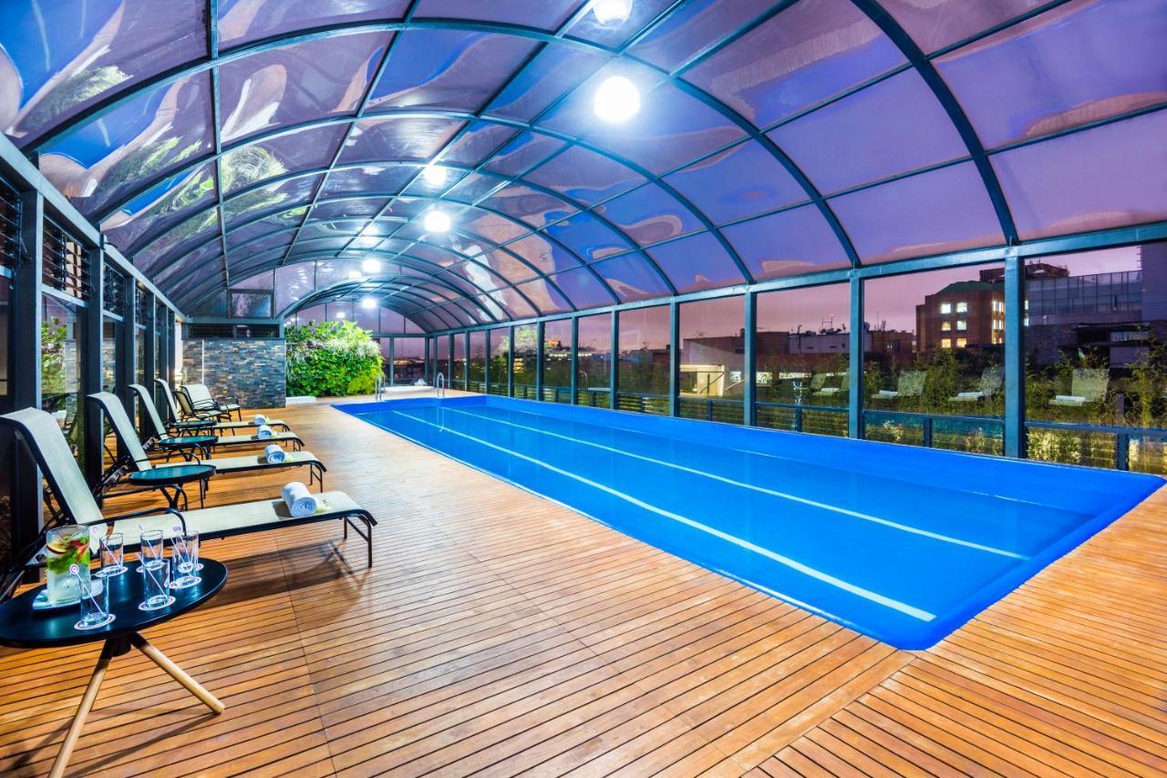 Cosmos 100 Hotel & Centro De Convenciones - Hoteles Cosmos Bogotá Exterior foto A pool enclosure